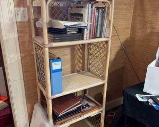 This photo is a hot mess but you can still appreciate this gorgeous MCM rattan bookshelf.