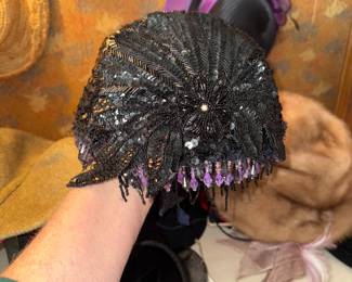 All you need is a flapper dress and this beaded hat to be the belle of the ball.