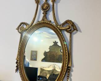 Pr of oval ornate mirrors. 