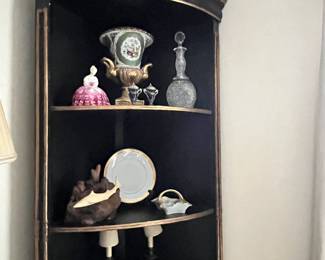 Pr. Painted black tall corner shelf units 