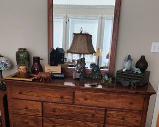Dresser with frog collection on top