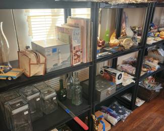 Lots of needlepoint and sewing supplies.