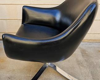 Pair of Mid Century Modern "Stowe & Davis" black leather & chrome swivel chairs.