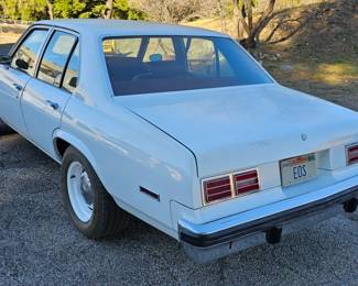 1976 Chevy Nova - Concours Model - 4 Door - Small Block 400hp Engine - White - Red Interior. Runs Great !