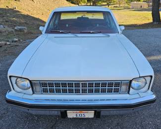 1976 Chevy Nova - Concours Model - 4 Door - Small Block 400hp Engine - White - Red Interior. Runs Great !