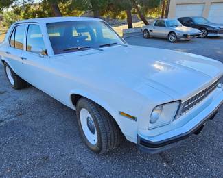 1976 Chevy Nova - Concours Model - 4 Door - Small Block 400hp Engine - White - Red Interior. Runs Great !