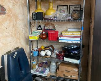 Vintage oil cans, pottery, Christmas decor, old tools