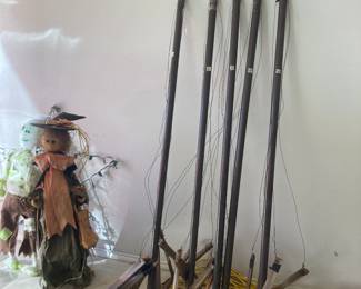 Poles with wires and stakes, makes Christmas trees.