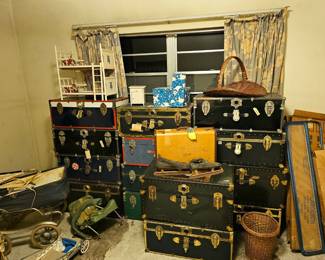 Steamer trunks / vintage baby carriages / doll furniture