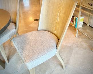 Modern breakfast table and four upholstered chairs