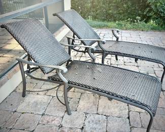 Two outdoor adjustable chaise lounge chairs