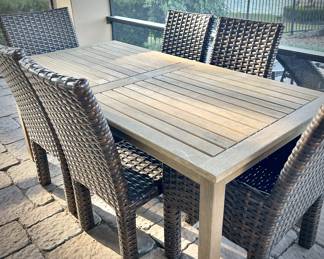 Teak table for six, with six woven patio chairs