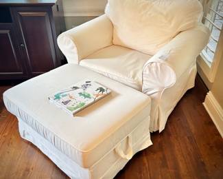 Pottery Barn off-white slip-covered armchair and storage ottoman