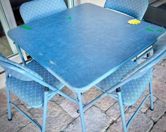 Card table and four folding chairs