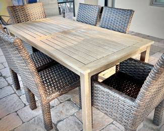 Teak table for six, with six woven patio chairs