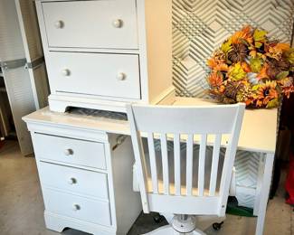 White desk, desk chair, and nightstand