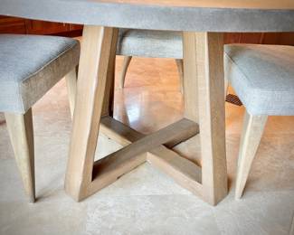 Modern breakfast table and four upholstered chairs
