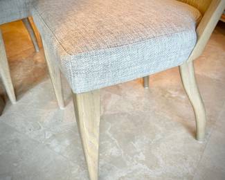Modern breakfast table and four upholstered chairs