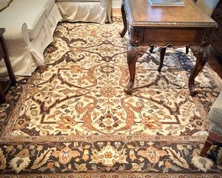 Pottery Barn L-shaped off-white sofa and Ralph Lauren Home oriental rug
