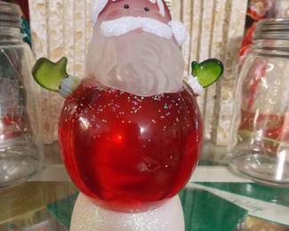 Santa snow globe that lights