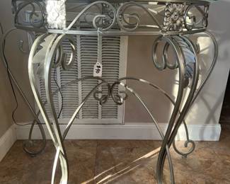 Silver glass top half moon table 