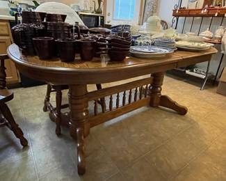 Solid oak trestle table with 2 captains chairs & 4 straight chairs