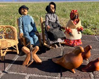 Birds are carved and signed by Virgil Ledford and dolls are probably carved by Helen Bullard. These are both great East Tennessee artists.
