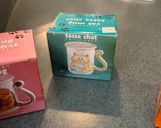4 adorable cat mugs