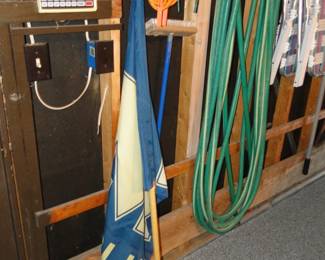 Brushes, hoses, extension cords and a flag
