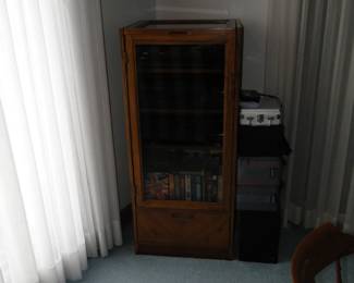 A very dark and foreboding, entertainment cabinet, or better yet, turn in into a spice cabinet, or bar