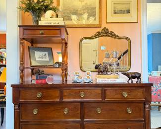 $250; “Bafsano” framed engraving by JT Wilmore in wood frame; 26x20 (top left). $250; “Venice-The Dogana” framed print by JT Wilmore; 19x17 (top right). $80; vintage gold mirror with botanical frill at top; 30x26 (center). $400; Milling Road Collection by Baker side table with drawer; 22x18x27 (top left). (SOLD; 7 drawer dresser with brass hardware by Baker, Milling Road Collection; 64x19x34. ) Shop sale in person for unique decor items.