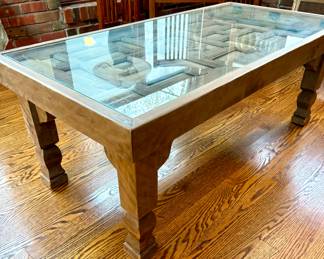 $600; coffee table with architectural salvaged wood covered in glass; 47x24x18
