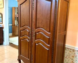 $350; beautiful wardrobe by Thomasville with two doors and adjustable shelves; 45x20x81