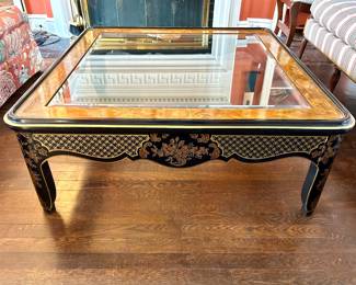 $300; vintage Drexel Chinoiserie coffee table with glass top and wood grain trim and detailed gold accents; 42x42x17. Matching side table available $150.