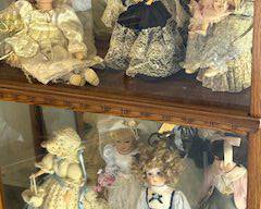 Porcelain dolls in collection