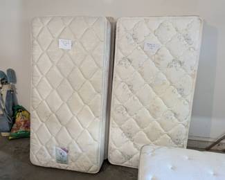 2 sets of twin mattresses and box springs
