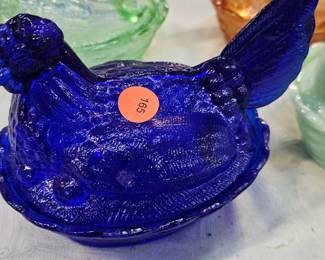 COBALT HEN ON NEST