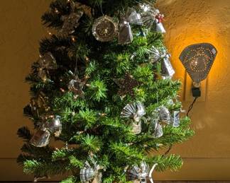 These Christmas Ornaments Repurposed Tin Cans. So did the Angel Night Light and Candle Holders
