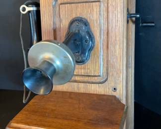 Wall-mounted, hand crank telephone