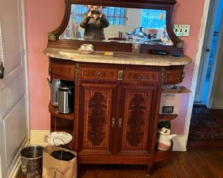 buffet with marble top and back mirror