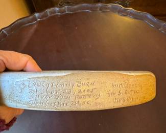 Vintage Glazed Pottery Folk art ring flask Description of hurricane Dafuski island 2005 signed on bottom