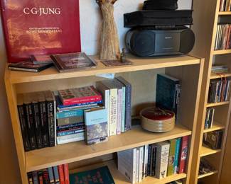 Jungian books, instrument, boom box