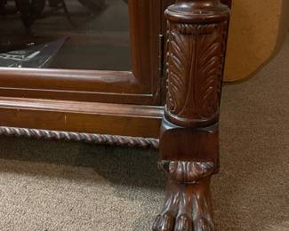 	#63	SC - Antique 3 Door Glass Bookcase/Curio Display Cabinet (no shelves) w/claw foot and carved wood.	$350.00																											