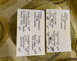 	#68	Federal Madrid Depression Glass - Yellow set: 6 divided plates, 6 dinner plates, 4 salad plates, 12 bread and butter, juice pitcher, plater, 6 berry bowls, sugar + creamer, relish dish, punch bowl + 6 cups	$250.00																											