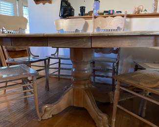 	#1	Bleached Oak - Pedestal Dining Room Table w/7 coordinating chairs (4 with cane bottom, 3 carved back) 2 leaves 11" each. 56-78x54x30	 $ 175.00 																											