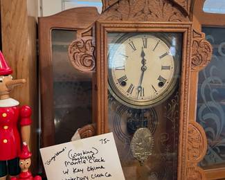 	#125	"Gingerbread" Working antique mantle clock w/key chime by Waterbury Clock Co	$75.00																											