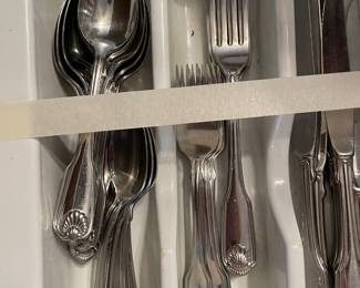	#67	Set of Flatware - 10 dinner knives, 4 salad forks, 4 forks, 6 soup spoons, 12 spoons, 4 serving spoons	$45.00																											