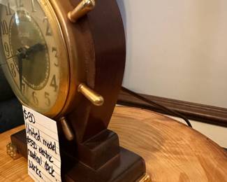 	#136	United Model #330 Electric Nautical Clock *working*	$30.00																											