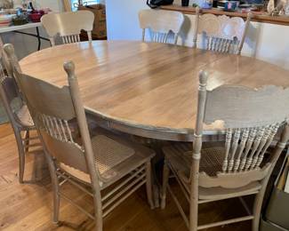 	#1	Bleached Oak - Pedestal Dining Room Table w/7 coordinating chairs (4 with cane bottom, 3 carved back) 2 leaves 11" each. 56-78x54x30	 $ 175.00 																											