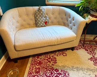 . . . nice cream-colored love seat